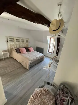 Un ou plusieurs lits dans un hébergement de l'établissement Location de maison Au fil de l O la Bouille