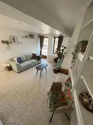 Coin salon dans l'établissement Location de maison Au fil de l O la Bouille