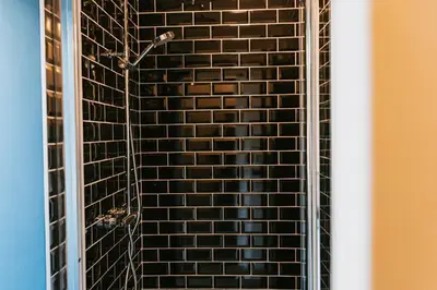 Salle de bains dans l'établissement Studio L'écume - Accès Piscine