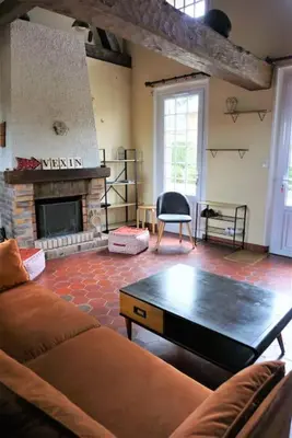 Coin salon dans l'établissement L'Escapade du Vexin normand - Spa