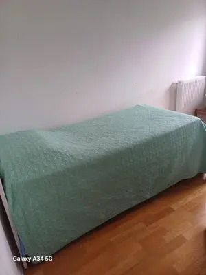 Un ou plusieurs lits dans un hébergement de l'établissement Beauvais chambre 1