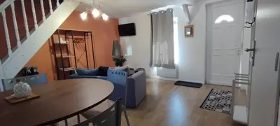 Coin salon dans l'établissement Le logis de la chouette