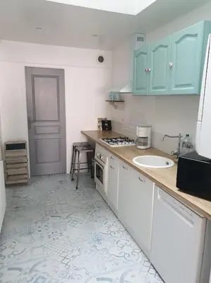 Cuisine ou kitchenette dans l'établissement Maison amienoise typique