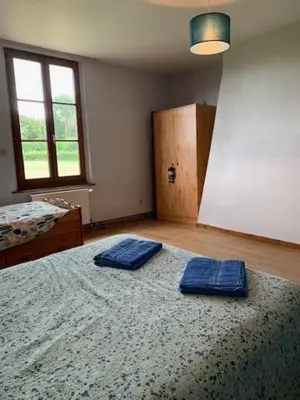 Un ou plusieurs lits dans un hébergement de l'établissement chambre d'hôtes