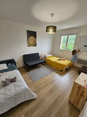 Coin salon dans l'établissement Maison Le Bois Petit