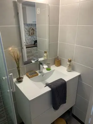 Salle de bains dans l'établissement O ' Garden et sa terrasse