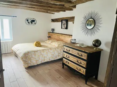 Un ou plusieurs lits dans un hébergement de l'établissement Maison en Colombage