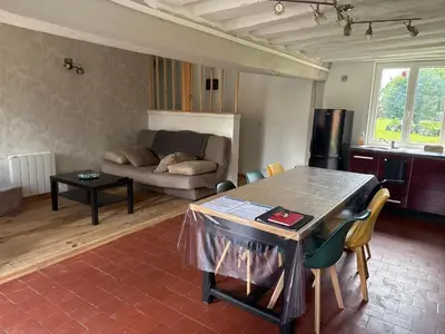 Coin salon dans l'établissement Maison en Colombage