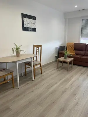 Coin salon dans l'établissement Home chic et renové
