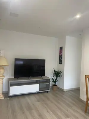 Télévision ou salle de divertissement dans l'établissement Home chic et renové