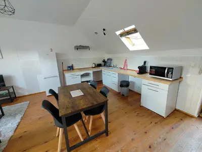 Cuisine ou kitchenette dans l'établissement Cosy appartement 2 chambres