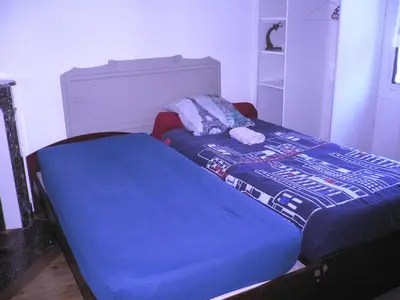 Un ou plusieurs lits dans un hébergement de l'établissement Invitation au voyage