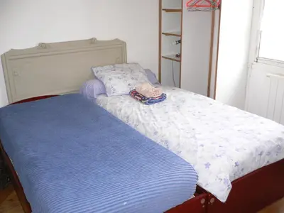 Un ou plusieurs lits dans un hébergement de l'établissement Invitation au voyage