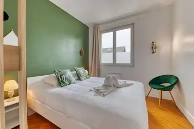Un ou plusieurs lits dans un hébergement de l'établissement Saint Maur F2 beau logement entier