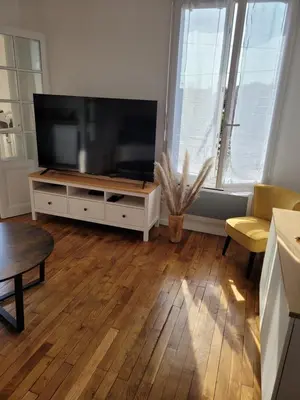 Télévision ou salle de divertissement dans l'établissement Appartement cosy