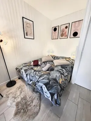 Un ou plusieurs lits dans un hébergement de l'établissement Studio cosy au cœur du quartier Saint-Pierre