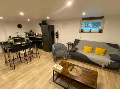 Coin salon dans l'établissement Appartement 60m2 6 voyageurs