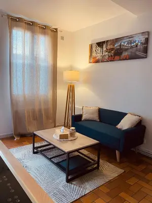 Coin salon dans l'établissement Cozy little house