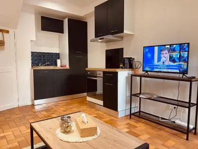 Cuisine ou kitchenette dans l'établissement Cozy little house