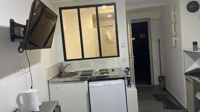 Cuisine ou kitchenette dans l'établissement Studio indépendant proche Paris et nature