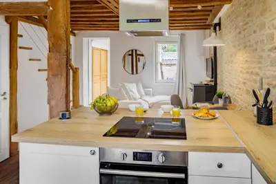 Cuisine ou kitchenette dans l'établissement Escapade au Cocon des Plaisirs Secrets Spa &Sauna