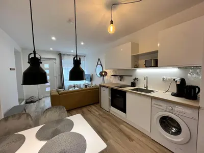 Cuisine ou kitchenette dans l'établissement L'escale Amiénoise Loft