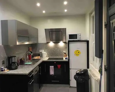 Cuisine ou kitchenette dans l'établissement Proche PARIS/Casino d’Enghien/stade de France/CDG