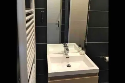 Salle de bains dans l'établissement Proche PARIS/Casino d’Enghien/stade de France/CDG