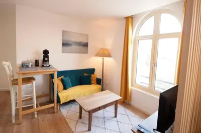Coin salon dans l'établissement Le Cosy & Boisé de Pontoise