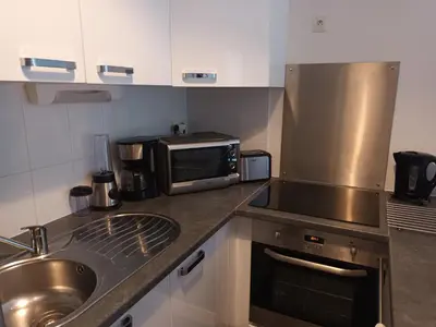 Cuisine ou kitchenette dans l'établissement résidence la clairière aux portes de la baie de Somme