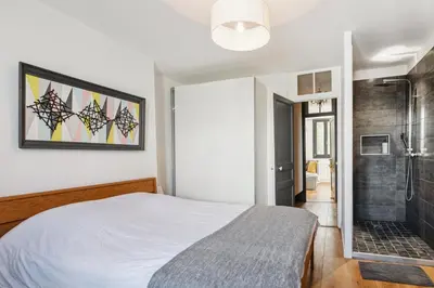 Un ou plusieurs lits dans un hébergement de l'établissement Villa The Treport - terrasses & vue mer