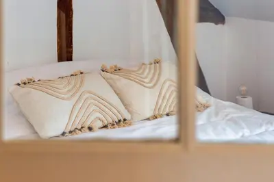 Un ou plusieurs lits dans un hébergement de l'établissement Michael beau F3 La Bouille