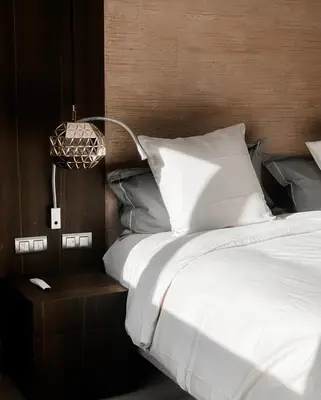 Un ou plusieurs lits dans un hébergement de l'établissement Suite privée avec sauna et spa à Saint-Fuscien