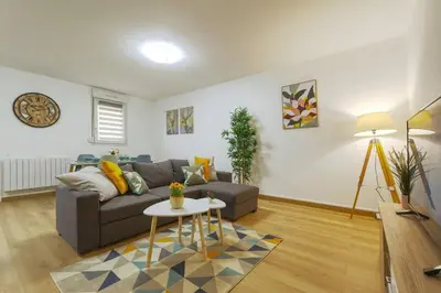 Coin salon dans l'établissement L'Elias : appartement de standing pour 6