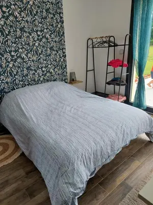 Un ou plusieurs lits dans un hébergement de l'établissement Studio à la campagne, 5 minutes de l'autoroute
