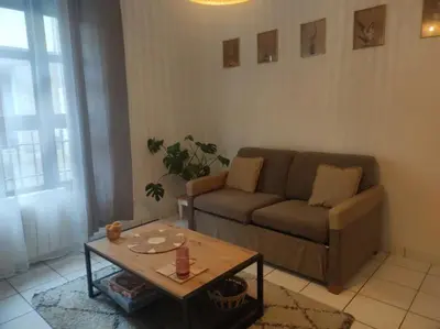 Coin salon dans l'établissement Le grand cocon de Saint Leu parking gratuit !
