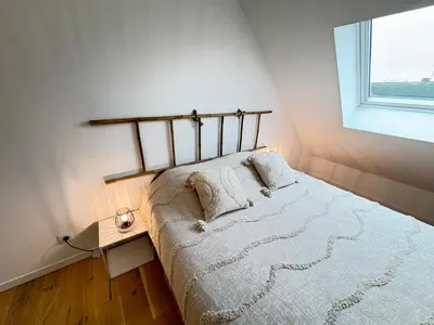 Un ou plusieurs lits dans un hébergement de l'établissement Maison 34 avec service de navette