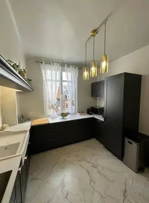 Cuisine ou kitchenette dans l'établissement Luxueuse maison Hypercentre Dieppe