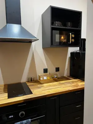 Cuisine ou kitchenette dans l'établissement Le secret d’Adam