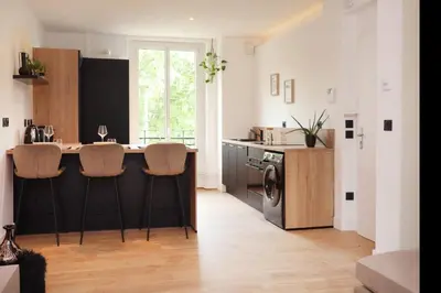 Cuisine ou kitchenette dans l'établissement Appartement Le Perchoir by La Boîte En Plus