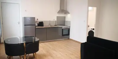 Cuisine ou kitchenette dans l'établissement Le voyageur - T2 hyper centre