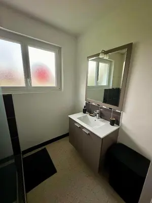Télévision ou salle de divertissement dans l'établissement Gîte 