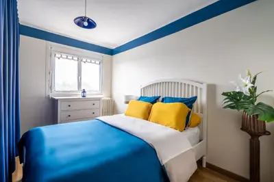 Un ou plusieurs lits dans un hébergement de l'établissement Poissy Appartement 2 chambres