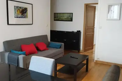 Coin salon dans l'établissement Poissy Appartement 2 chambres