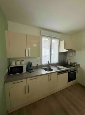 Cuisine ou kitchenette dans l'établissement cosy mery