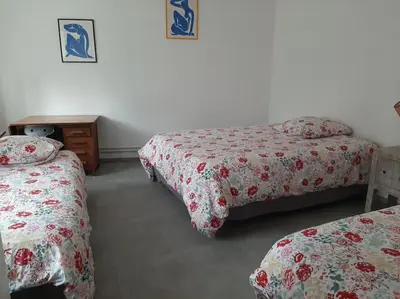 Un ou plusieurs lits dans un hébergement de l'établissement Maison de ville à Pacy-sur-Eure, proche Giverny
