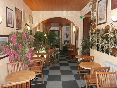 Coin salon dans l'établissement Hotel Beausejour