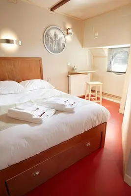 Un ou plusieurs lits dans un hébergement de l'établissement Péniche Daphné's