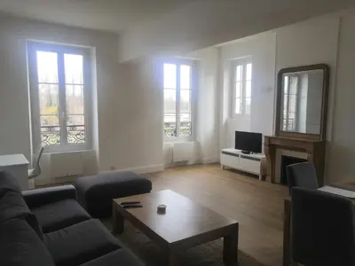 Coin salon dans l'établissement Grand 2P vue seine