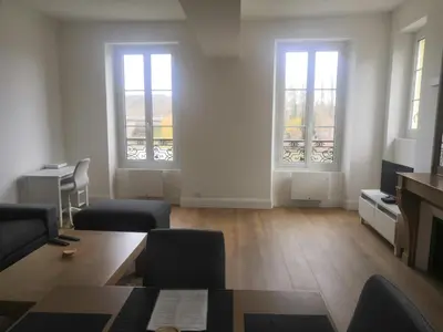 Coin salon dans l'établissement Grand 2P vue seine